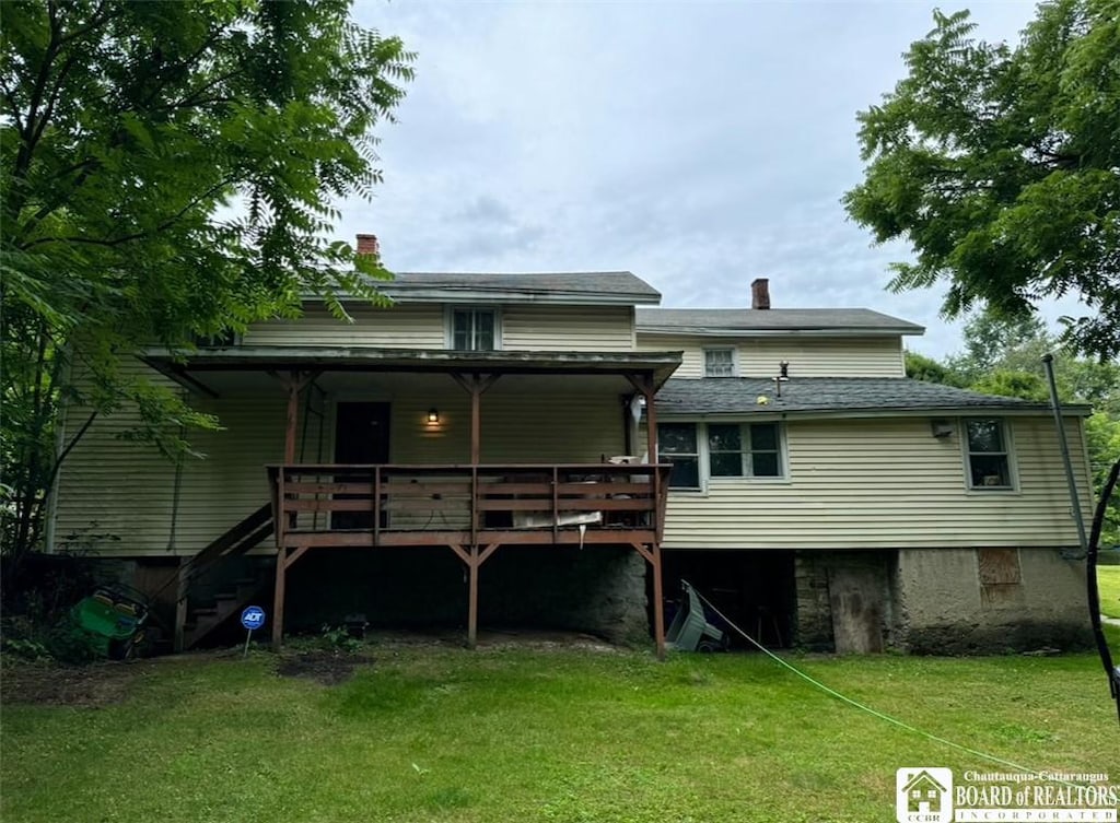 31 Hazzard St, Jamestown, NY 14701 - rear view of house featuring a lawn and a chimney