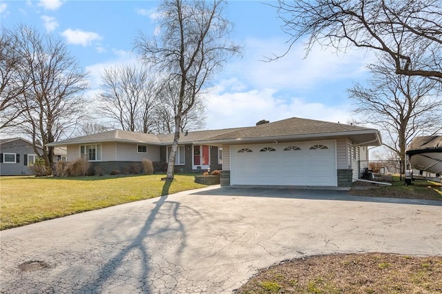 ranch-style home with driveway, an attached garage, and a front yard