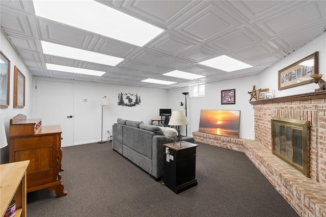 living room featuring dark colored carpet and a brick fireplace