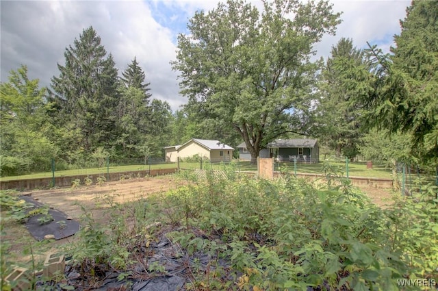 view of yard with fence