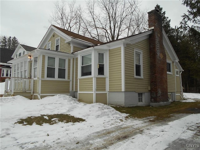 32 Fenner St, Cazenovia, NY 13035 - bungalow-style house with a chimney