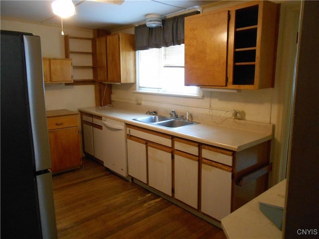 32 Fenner St, Cazenovia, NY 13035 - kitchen with a sink, wood finished floors, freestanding refrigerator, white dishwasher, and light countertops