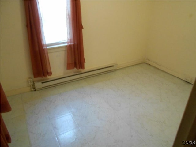 32 Fenner St, Cazenovia, NY 13035 - spare room with a baseboard heating unit and baseboards