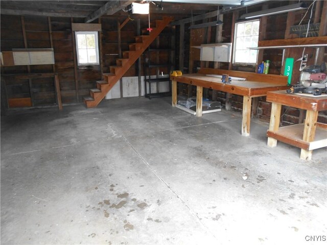 32 Fenner St, Cazenovia, NY 13035 - garage with a workshop area and a garage door opener