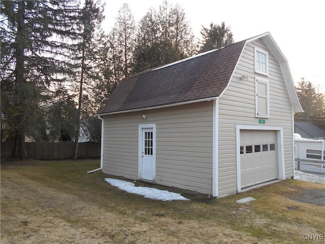 32 Fenner St, Cazenovia, NY 13035 - garage featuring a garage and fence