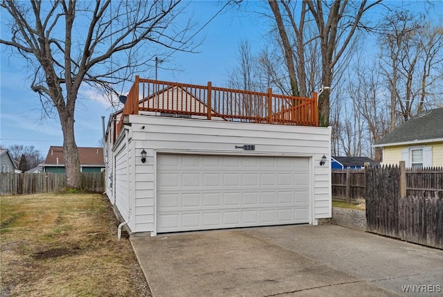 detached garage with fence