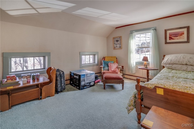 bedroom featuring baseboard heating, carpet flooring, and vaulted ceiling