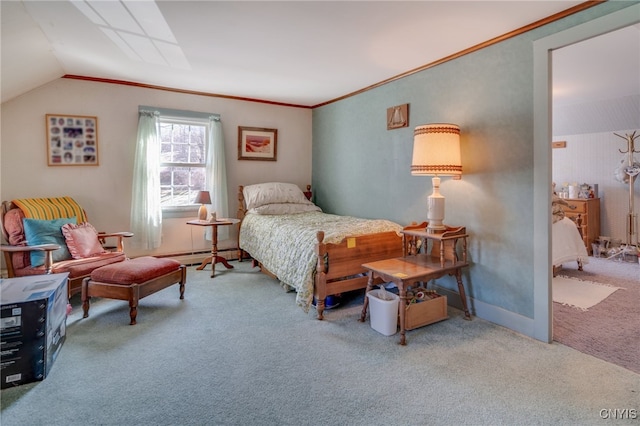 carpeted bedroom with baseboard heating, crown molding, and vaulted ceiling