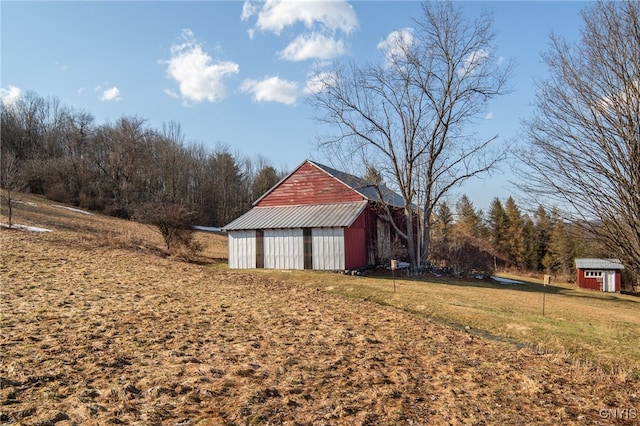 exterior space with an outbuilding