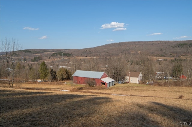 view of mountain feature with a rural view