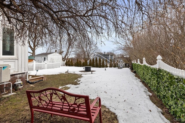 view of yard featuring an outdoor structure and fence private yard