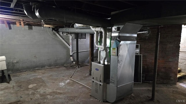 unfinished basement with heating unit