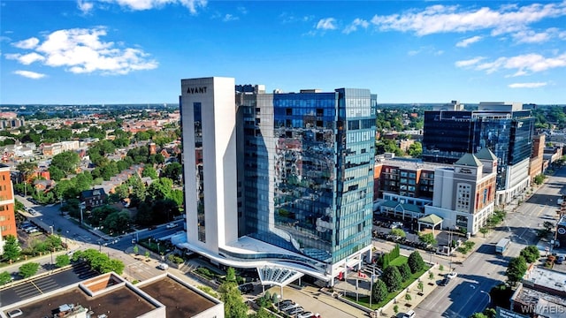 birds eye view of property featuring a city view