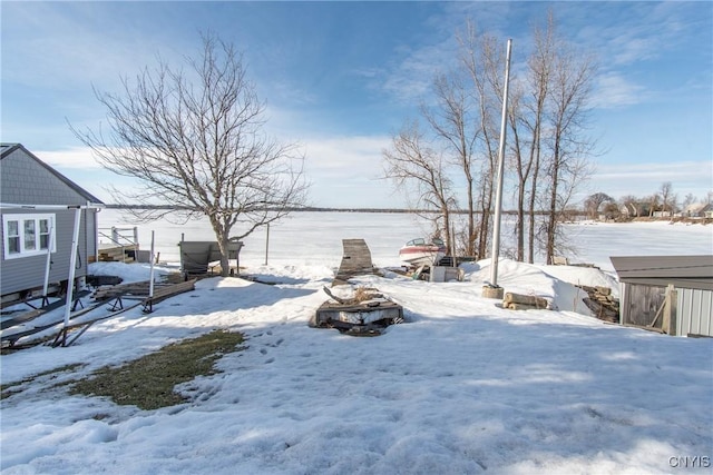 view of yard covered in snow