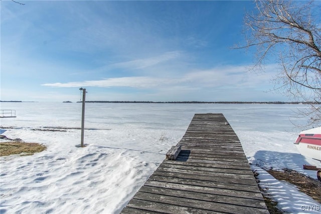 dock area featuring a water view