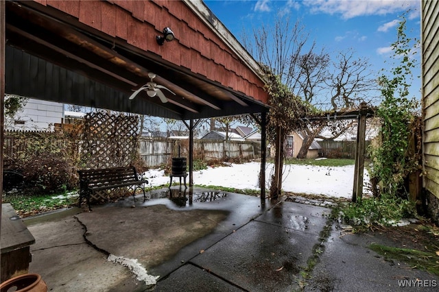 view of patio / terrace with a fenced backyard and ceiling fan