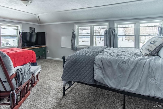 bedroom with multiple windows, carpet floors, baseboards, and vaulted ceiling