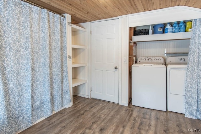 washroom with built in features, laundry area, wooden ceiling, wood finished floors, and washer and dryer