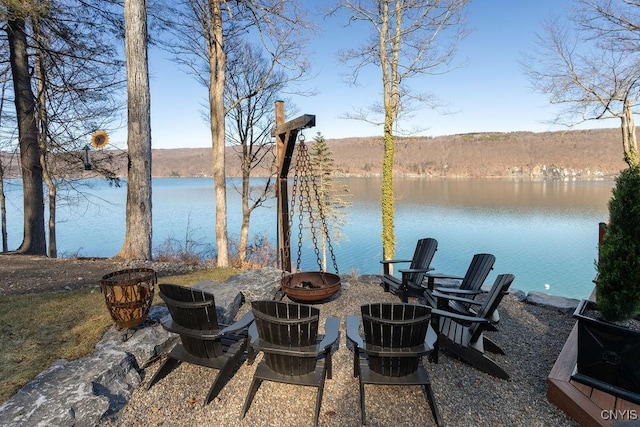 view of patio with a water view