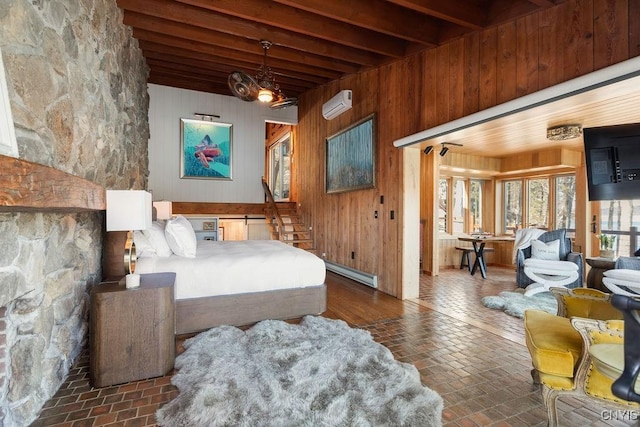 bedroom with wooden walls, a wall mounted AC, beam ceiling, brick floor, and baseboard heating