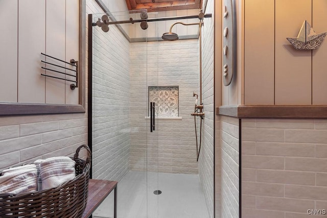 full bath with a shower stall