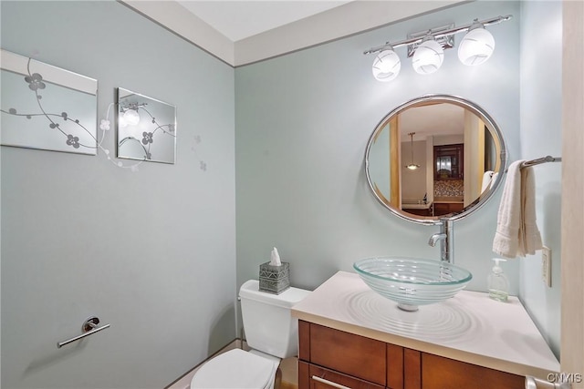 half bath with toilet and vanity