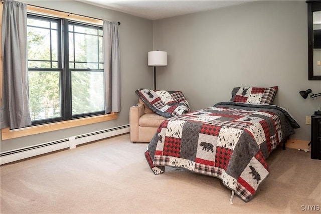 carpeted bedroom featuring a baseboard radiator