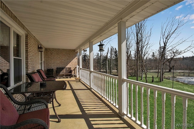 balcony featuring a porch