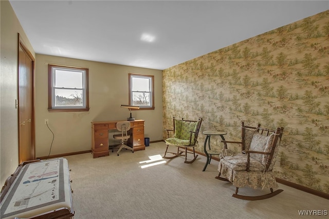 unfurnished room with baseboards, plenty of natural light, and wallpapered walls