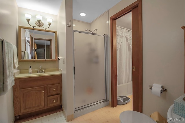 bathroom featuring a chandelier, toilet, a shower with shower curtain, tile patterned floors, and vanity