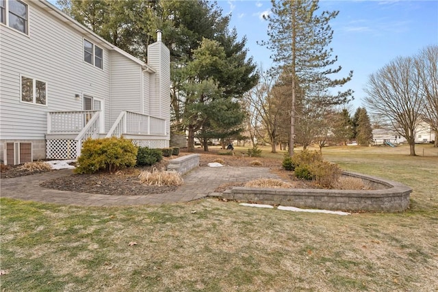 view of yard with a deck