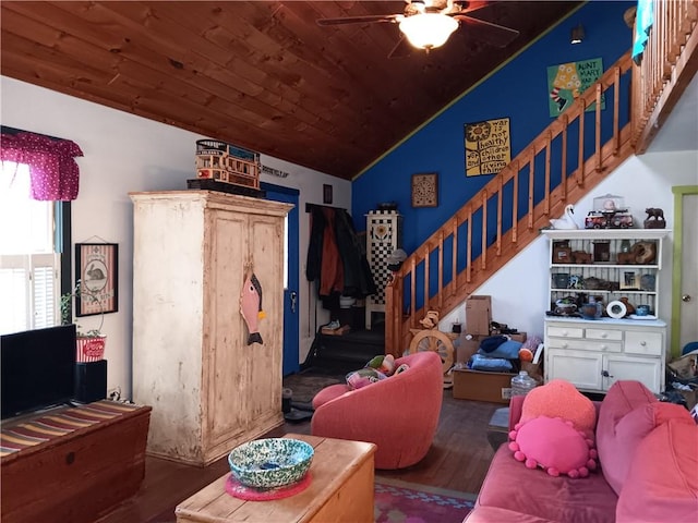 living room featuring a ceiling fan, wood finished floors, wooden ceiling, lofted ceiling, and stairs