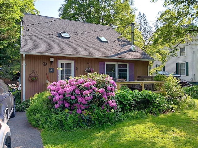 118 Roosevelt Ave, Roxbury, NY 12474 - view of front of home featuring a front lawn and roof with shingles