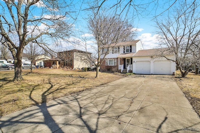 view of front of house featuring concrete driveway, brick siding, and a garage