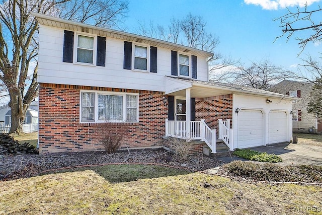 view of front of house featuring brick siding, an attached garage, and driveway