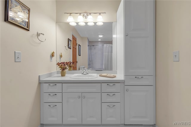 full bathroom with vanity and a shower with curtain