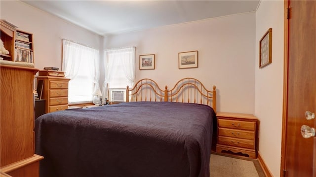 bedroom featuring baseboards