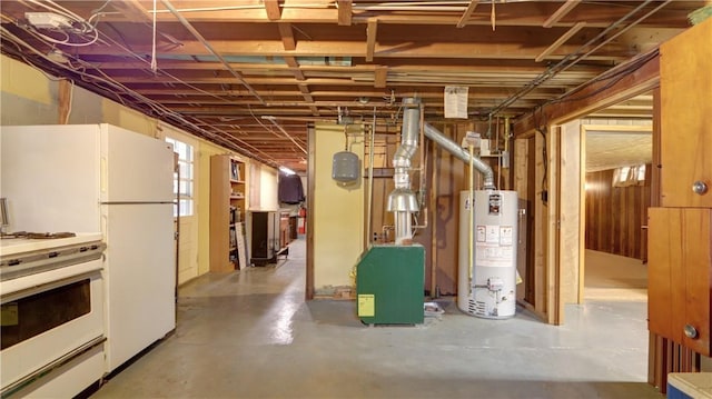 below grade area with gas water heater and freestanding refrigerator