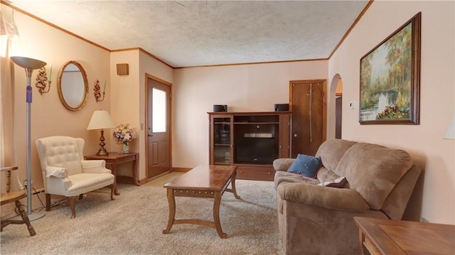 living area with crown molding, baseboards, light colored carpet, arched walkways, and a textured ceiling