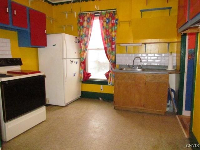 kitchen with white appliances, light floors, open shelves, a sink, and backsplash