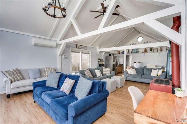 living area with light wood finished floors, beam ceiling, a ceiling fan, and a wall unit AC