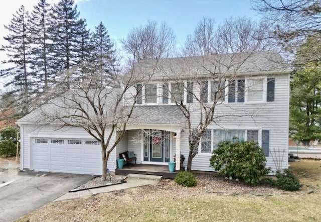 view of front of house with a garage and driveway