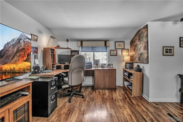 home office with wood finished floors and baseboards