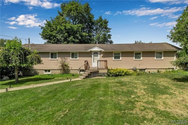 single story home with a front lawn