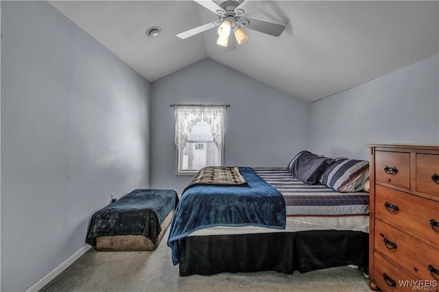 bedroom featuring baseboards, lofted ceiling, ceiling fan, and carpet flooring