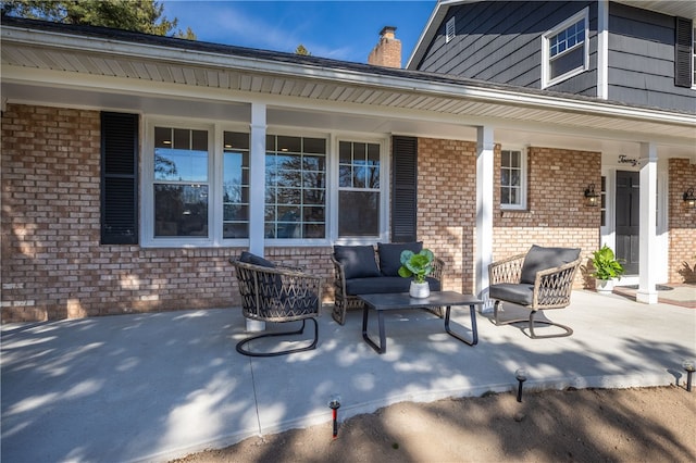 view of patio featuring covered porch