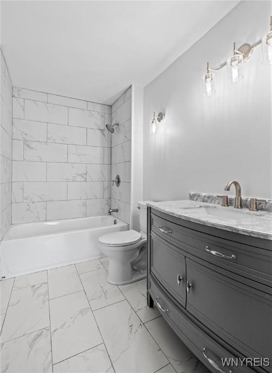 full bathroom featuring shower / bath combination, marble finish floor, toilet, and vanity