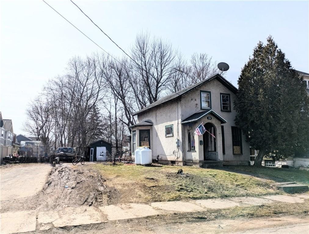 view of front of home with stucco siding