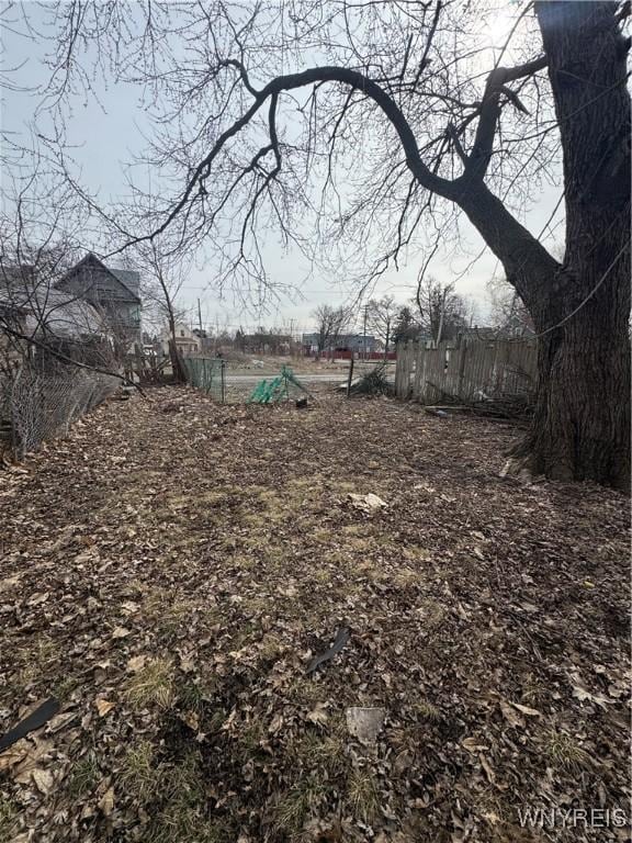 view of yard featuring fence