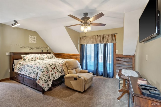 bedroom with baseboards, carpet, ceiling fan, and vaulted ceiling